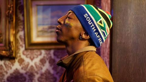 South African football supporter reacting during the opening match in Johannesburg