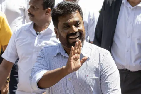 Getty Images Anura Kumara Dissanayake smiling and waving