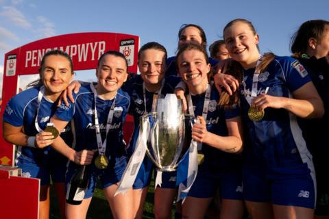 Cardiff City women celebrate with the Adran Premier trophy