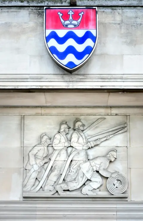 Alamy GLC coat of arms on Lambeth Fire Station, Albert Embankment, London, United Kingdom