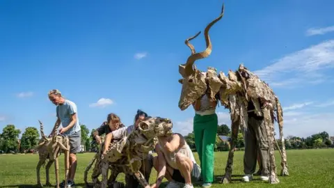 UAL students with the puppets 