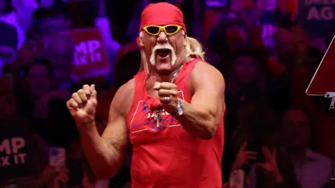 Getty Images Former WWE wrestler Hulk Hogan dances during a campaign rally for Republican presidential nominee, former U.S. President Donald Trump, at Madison Square Garden on October 27, 2024 in New York City