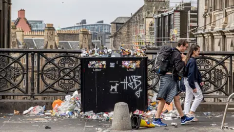 Getty Images An overflowing bin in Edinburgh 