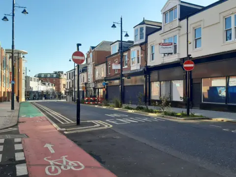 LDRS The other side of Holmeside with the words 'no entry' written on the road and two red no entry circular signs on either side.