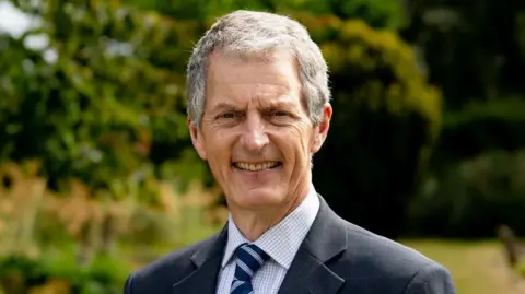 Vice-chancellor David Maguire