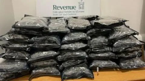 Irish Revenue Service Image of vacuum packed drugs in stacks of black bags