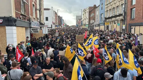 Large crowd of people in Old Market, Bristol. 