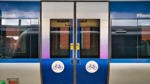 Getty Images A Translink train carriage with the doors closed viewed head on.