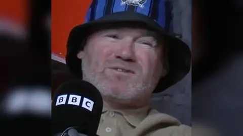 Wayne Rooney grimacing