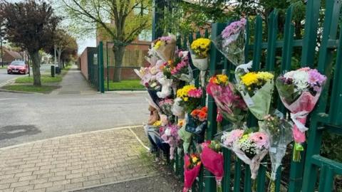 Floral tributes on Hopewell Road in Hull where a 5-year-old girl was killed in a lorry crash