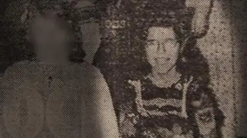 Black and white photograph of Angela as a child. 