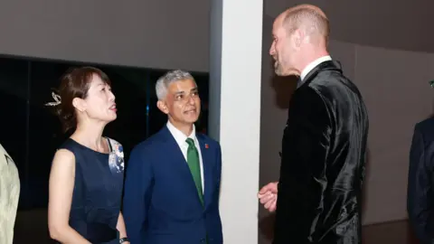 William announces Earthshot Prize 2025 winners in Rio Daily Mirror/PA The Prince of Wales speaks with London Mayor Sir Sadiq Khan. They are both wearing suits.