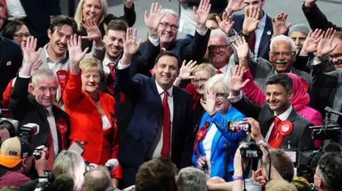 PA Media Labour politicians celebrate after winning every Glasgow seat in the general election 