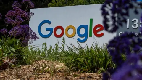 The logo of tech company Google on display at a building in Silicon Valley