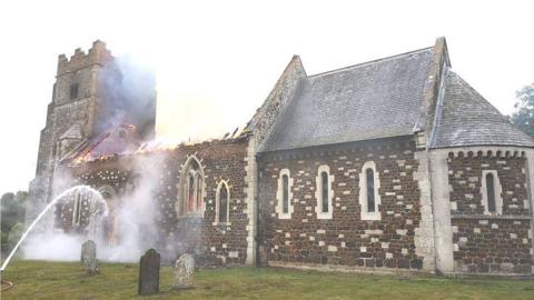 The fire at the Church of St Mary being extinguished