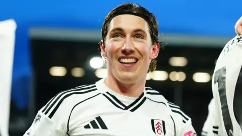 Harry Wilson of Fulham celebrates scoring a goal after making it 2-1
