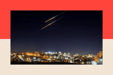 Reuters Missiles launched from Iran towards Israel are seen from Hebron