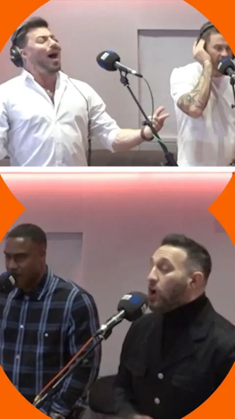 Four men in a studio, singing.