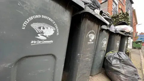 STUART WOODWARD/BBC Black bins 