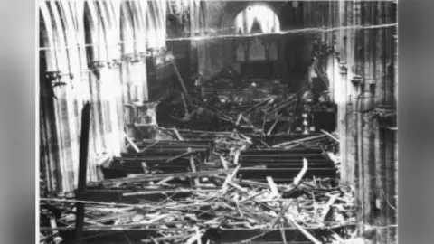 Llandaff Cathedral A grainy black and white photo of the inside of Llandaff Cathedral destroyed by bombing
