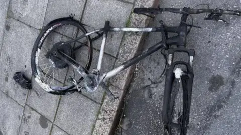 A charred e-bike