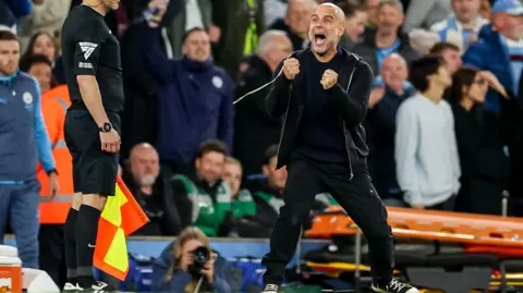 Pep Guardiola celebrates