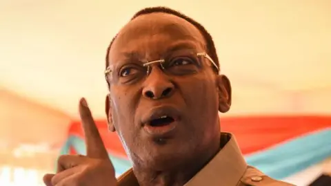 AFP Tanzania's main opposition Chadema party chairman Freeman Mbowe speaks during a press conference in Dar es Salaam, Tanzania - March 2022