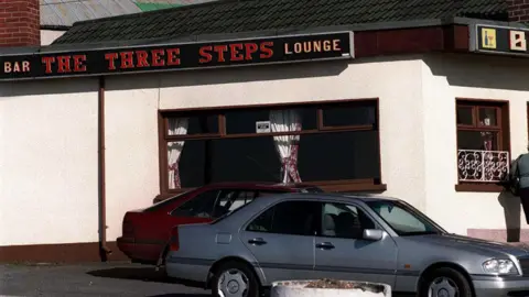 The Pacemaker archive image shows a small white-painted pub with the name “The Three Steps” in red letters on top.