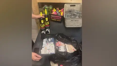 Liverpool City Council A selection of seized goods including Nitrous oxide canisters.