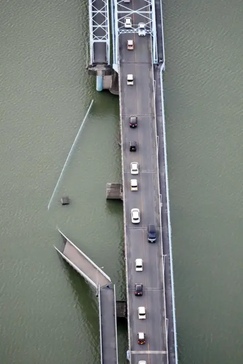 Reuters Part of a bridge collapsed into the water