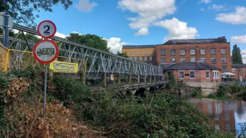 Darley Abbey temporary footbridge, known as Walter's Walkway.