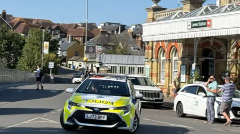 A police car outside Lewes station.