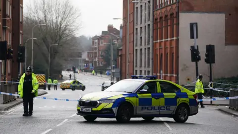 Jacob King/PA Wire Police at the scene at the campus of De Montfort University in Leicester, after an 18-year-old man was arrested on suspicion of murder after a man in his 20s was stabbed in Leicester city centre near the university