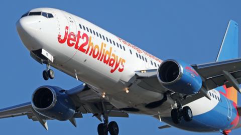 A Jet2 flight in the air