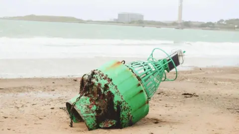 Dreamcatcher Photography /Aneta Jeziorska-Entwistle Buoy onshore in Jersey
