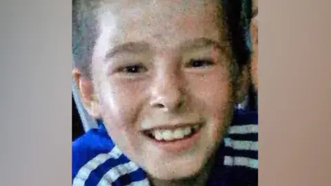Police Scotland Shea Ryan is pictured smiling and wearing a blue top with white stripes.