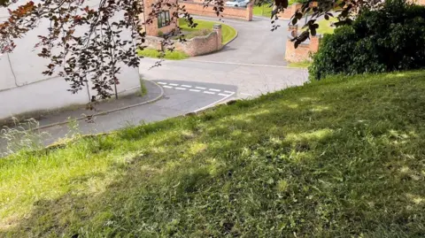 HSE View from the graveyard down to the road