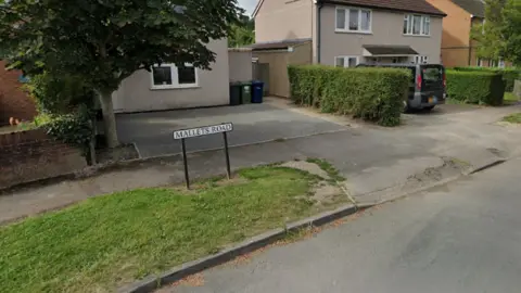 A road sign for Mallets Road in Cambridge. 