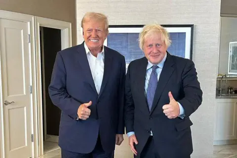 Boris Johnson/X Boris Johnson poses for a photograph with Donald Trump 