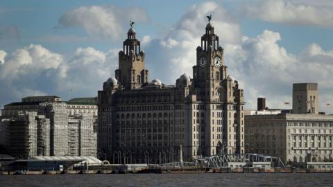 General skyline view of the iconic Liverpool waterfront property the Royal Liver building, viewed across the River Mersey