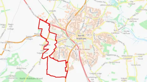 Ordnance Survey A map showing North Walsham, with red markings outlining the land which would be developed.