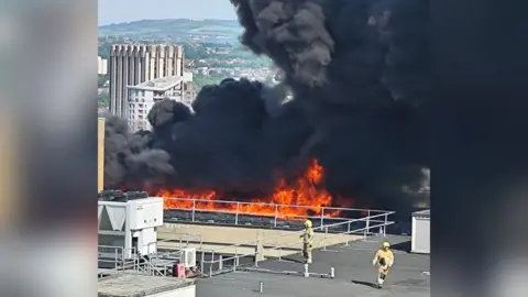 Fire on top of hospital building