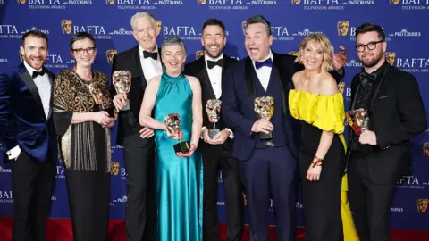 Martin McCann, Louise Gallagher, Stephen Wright, Amanda Black, Adam Patterson, Declan Lawn, Sian Brooke and Jack Casey in the press room after winning the Drama Series Award for 'Blue Lights' at the 2025 BAFTA TV Awards at the Royal Festival Hall in London, Britain, 11 May 2025.