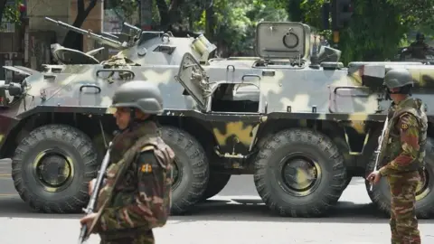 heavily armed troops in dhaka