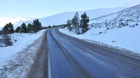 Steven Brown/Geograph Cairngorm ski road with snow on either side of the road