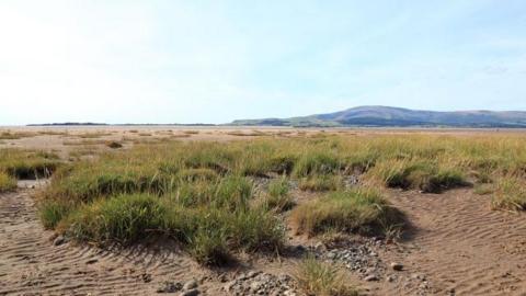 From the foreshore at Askam looking north-west across the Duddon Sands towards Millom on the left and Black Combe in the distance