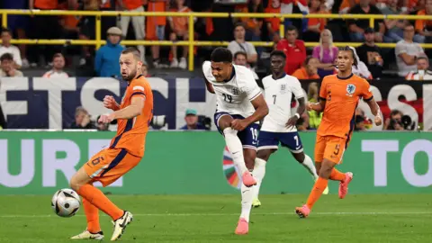 Getty Images Ollie Watkins scoring the winner against the Netherlands in the Euros semi-final