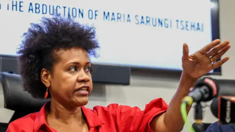 Reuters A photo of Maria Sarungi Tsehai during the press briefing in Kenya's capital Nairobi 