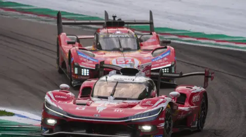 Getty Images Toyota Racing's Toyota TR010 Hybrid, driven by Sebastien Buemi from Switzerland, Brendon Hartley from New Zealand, and Ryo Hirakawa from Japan, competes during the WEC 6 Hours of Imola at Autodromo Enzo e Dino Ferrari in Imola, Italy, on April 19, 2026