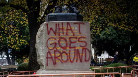 ABC News/Luke Bowden The vandalised William Crowther statue